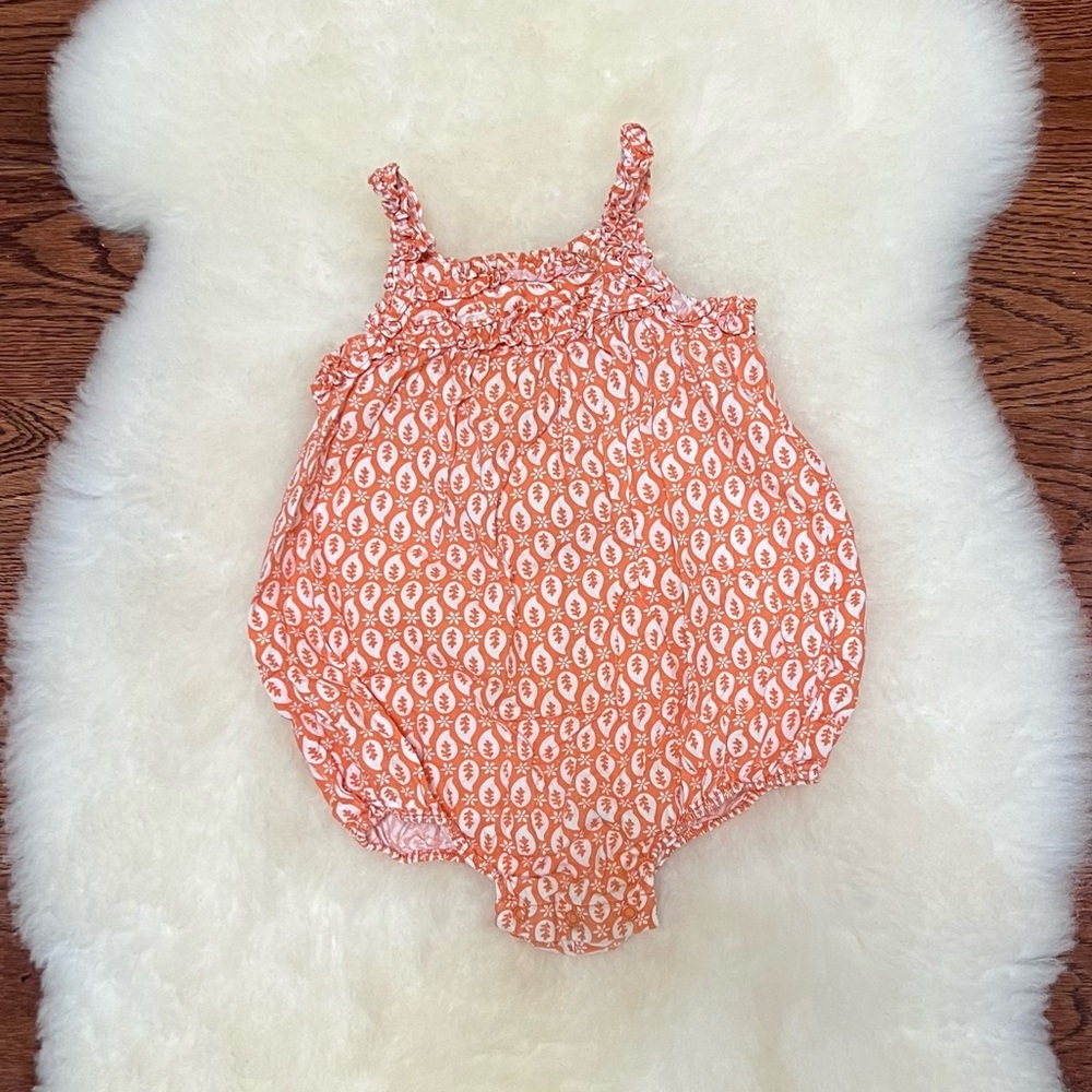 Old Navy soft orange ruffle bubble romper. 12-18.